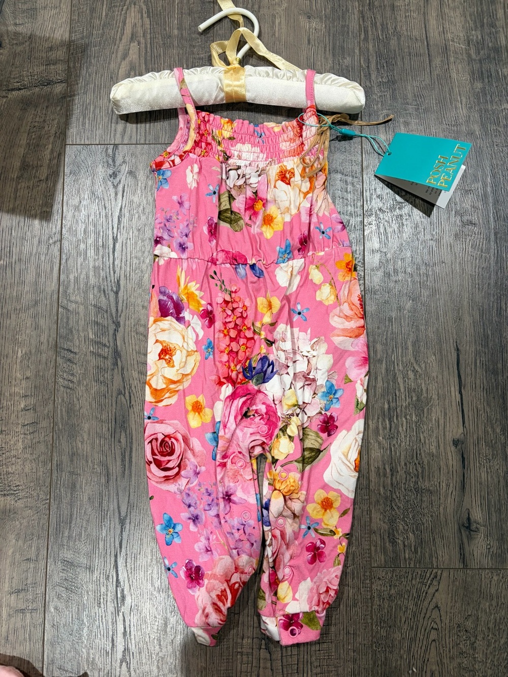 Posh Peanut Pink Floral Smocked Jumpsuit with Multicolor Blooms